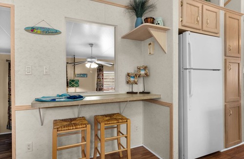 Upper Grand Lagoon Cottage | Charming pet-friendly cottage in a gated resort with amenities on the east end of Panama City Beach!