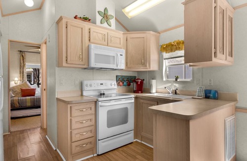 Upper Grand Lagoon Cottage | Charming pet-friendly cottage in a gated resort with amenities on the east end of Panama City Beach!