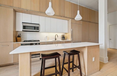 Tulane - Gravier Apartment | Chic 2BR in Historic Schoolhouse w/Private Balcony and Gated Parking
