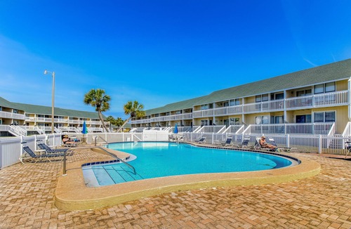 Holiday Isle Apartment | Coastal Condo with heated pool, hot tub, tennis, & beach access