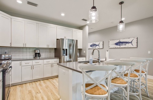 Thomas Drive House | Coastal Cove | 4BR Luxury Home, Walk to Beach, BBQ Patio, Beach Gear Provided