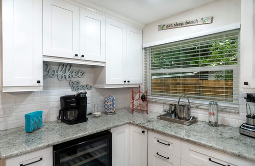 Tarpon Springs House | Coastal Luxury - Walk to Beach - Heated Pool