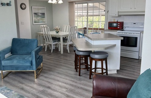 Port Charlotte House | Coastal, Waterfront Haven with boat dock