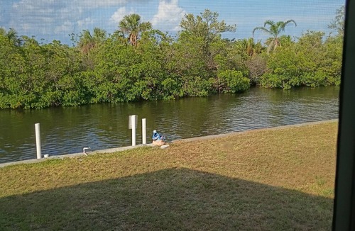 Port Charlotte House | Coastal, Waterfront Haven with boat dock