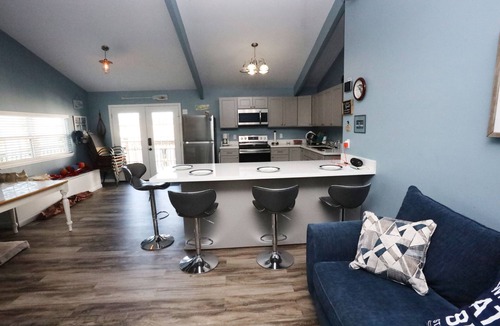 Jamaica Beach House | Comfy Canal Home 2 Min Dr to Beach + Outdoor Space/Fishing!