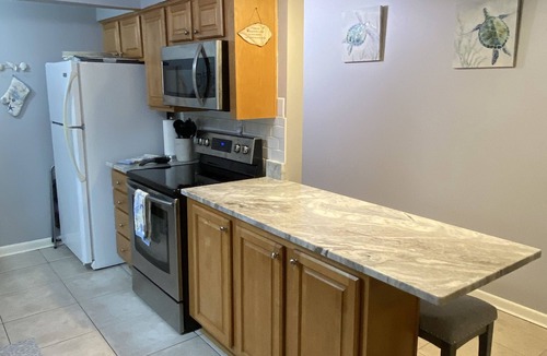 Mary Esther Condo | Comfy Condo with Water Views- Fishing Dock- Sleeps 4