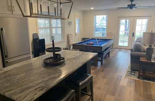 Broaddus House | Completely Updated Waterfront Escape with a Hot Tub Ready For Family and Friends