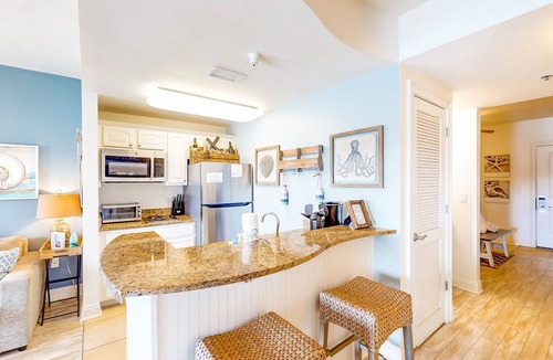 Sunnyside Apartment | Contemporary condo with lake views, free WiFi and cable, and resort amenities