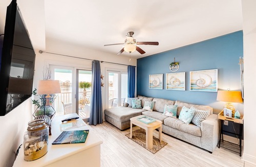 Sunnyside Apartment | Contemporary condo with lake views, free WiFi and cable, and resort amenities