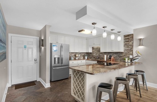Holiday Isle Condo | ✨Corner Unit~Stunning 6th Floor Gulf+Harbor View~2BR Dolphin Point602A
