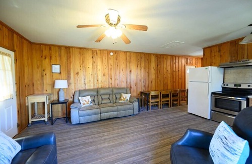 Lake Village Cabin | Cottage tucked in back of orchard with full kitchen and lake access!