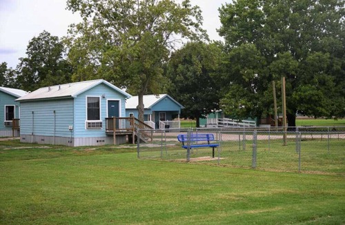 Lake Village Cabin | Cottage tucked in back of orchard with full kitchen and lake access!