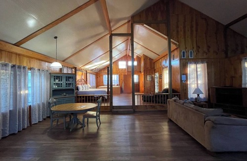 Zwolle Cabin | Couples Retreat with King Canopy Bed, Jacuzzi for Two, Fireplace & Pond-View Porch