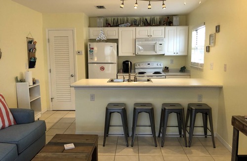 Navarre Beach House | Cozy 1 Bedroom Townhome with a pool and just steps from the beach.