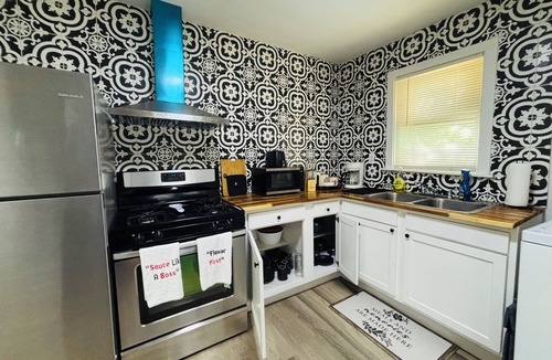 Highland Historic District Apartment | Cozy 2BR Retreat TVs in Every Room Streaming Included