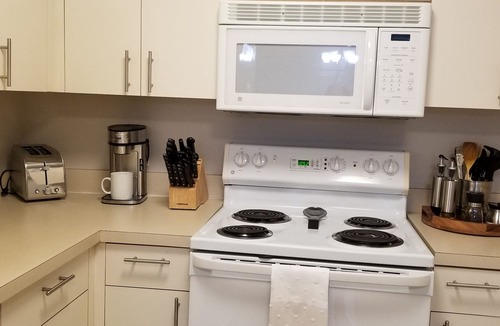 Vanderbilt Beach House | Cozy and spacious 3/2 condo. Family friendly. 3 Mins to the beach. Dog friendly