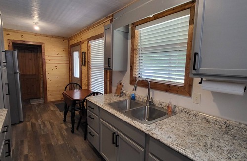 Gilmer Cabin | Cozy Lakefront 2-bedroom cabin in tranquil Big Sandy, TX.