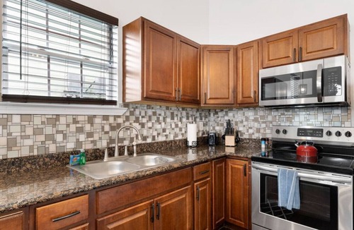Tulane - Gravier House | Cozy Mid-City Cottage | Outdoor Patio w/Backyard