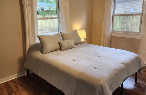 West Pensacola House | Cozy "Tree House" centrally located, 20 minutes to Perdido or Pensacola Beach!