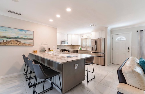 Southgate House | Creekside Heated Pool Mini Put Put in Heart of SRQ