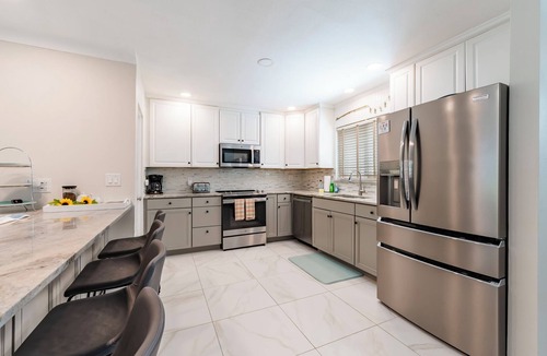 Southgate House | Creekside Heated Pool Mini Put Put in Heart of SRQ