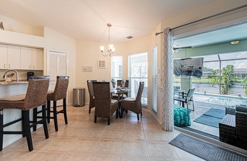 Crown Pointe House | Crown Pointe lake view heated pool home (w/2 King bedrooms) minutes to downtown & beaches!