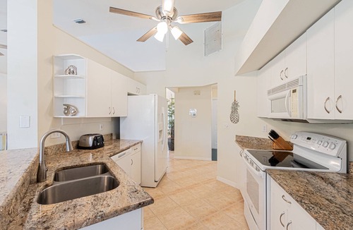Crown Pointe House | Crown Pointe lake view heated pool home (w/2 King bedrooms) minutes to downtown & beaches!