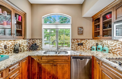 Gulf Breeze House | Delightful escape on the sound with beach access, dock, furnished deck, and WiFi