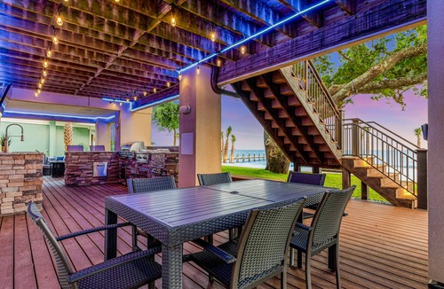 Gulf Breeze House | Delightful escape on the sound with beach access, dock, furnished deck, and WiFi