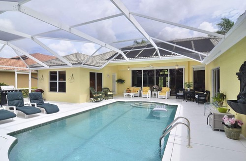 Central Naples House | Designer Furnished Lakefront Home In Briarwood Development
