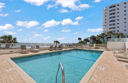 Seawinds Condo Apartment | Direct oceanfront Ormond Beach 2/2 with private balcony, heated pool and garage