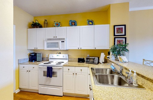 Frangista Beach Condo | Dog-friendly condo with pool, hot tub, private balcony, AC, & washer/dryer