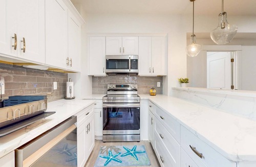 Navarre Beach House | Dog-friendly house near the beach, balconies, washer&dryer, & cable
