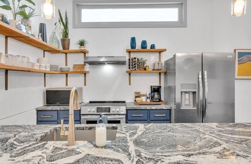 Tulane - Gravier House | Eco-friendly 5BR Mid-City home near Superdome. Fire pit, parking, walk to streetcar & parades.