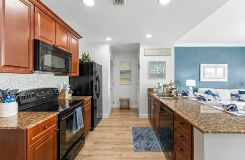 Upper Grand Lagoon Condo | Elegant Bayfront Condo | Massive Pool and Hot Tub