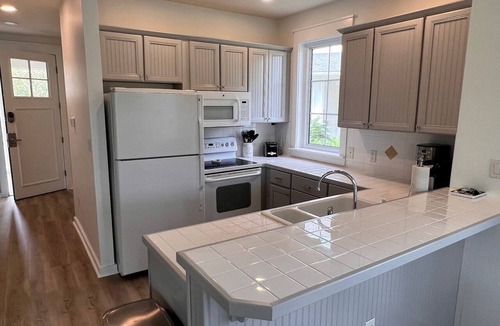 Laurel Grove House | Elegant Emerald Coast Golf Cart Lakefront Vacation Home Florida