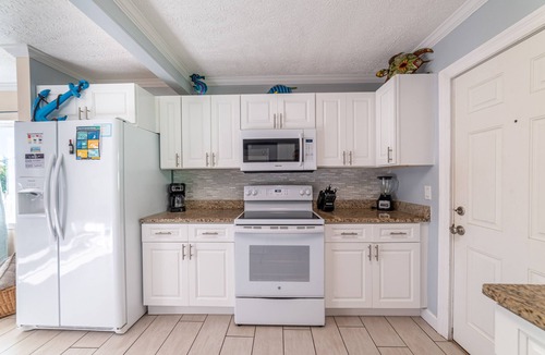 Biltmore Beach House | Emerald Beach Cottage-PCB-Gorgeous 1950s Vintage Cottage-Short Walk to Beach-Fire Pit-Pet Friendly