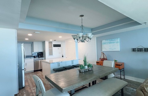 Thomas Drive Condo | Emerald Water & Sugar White Sand Awaits You! Beachfront Condo, Pool