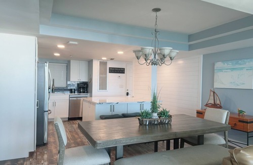 Thomas Drive Condo | Emerald Water & Sugar White Sand Awaits You! Beachfront Condo, Pool