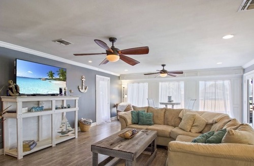 New Orleans East Area House | Enjoy this serene waterfront getaway with boat dock and deck.