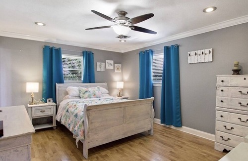 New Orleans East Area House | Enjoy this serene waterfront getaway with boat dock and deck.