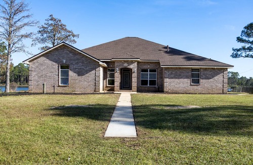 Pensacola House | Enjoy this waterfront home with a pool, dock, and Blue Angels! Bring your boat!