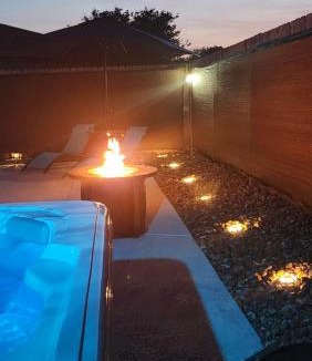 Deer Park House | Entire Home, Watch Your Favorite Movies at the "Dive-In" Centrally Located, 3-2 with Hot Tub & Firepit