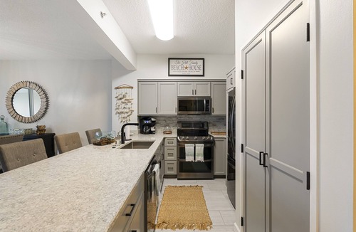 Four Mile Village Condo | Exquisite Condo - Steps to the Beach - Tops'l Tides 609
