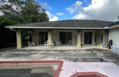 Jog Road House | Fabulous 5-bedroom bungalow, minutes from major highways and beach.