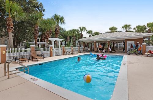 Santa Rosa Beach House | Family cottage with four porches & shared pool - walk to beach dining & more