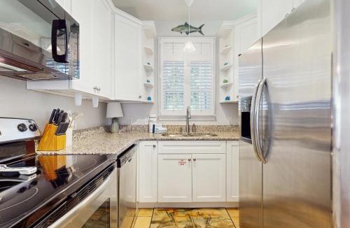 Santa Rosa Beach House | Family cottage with four porches & shared pool - walk to beach dining & more