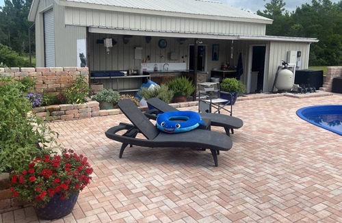 Magnolia Bluffs House | Family secure home with your own Tiki Hut close to Beach SGI. Clean and modern.