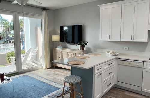 Gulf Place Condo | First floor condo overlooking the heated pool. Steps from the private beach!
