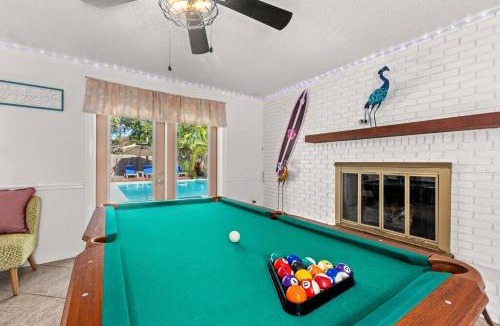 Upper Grand Lagoon House | Flirty Flamingo with Private Heated Pool, Game Room, and AMAZING Covered Outdoor Living